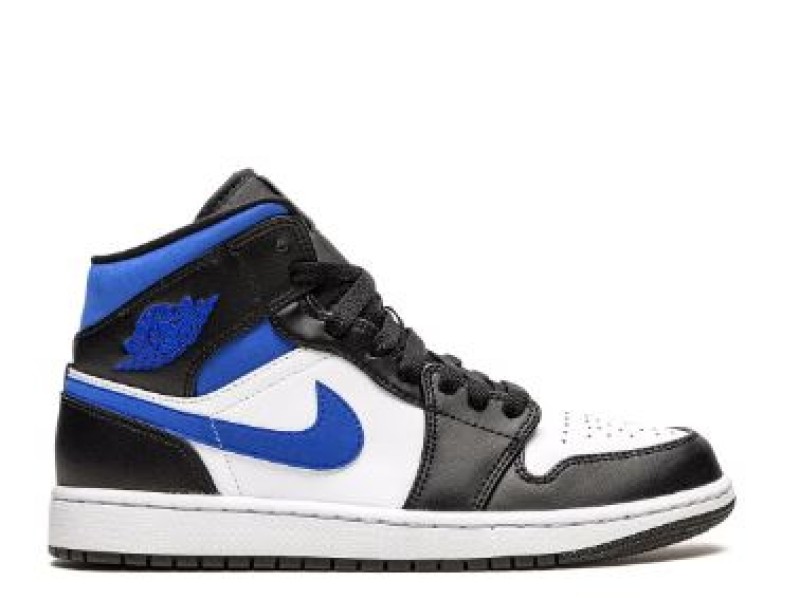 Nike Air Jordan 1 Mid amarillas con blanco y logo negro.